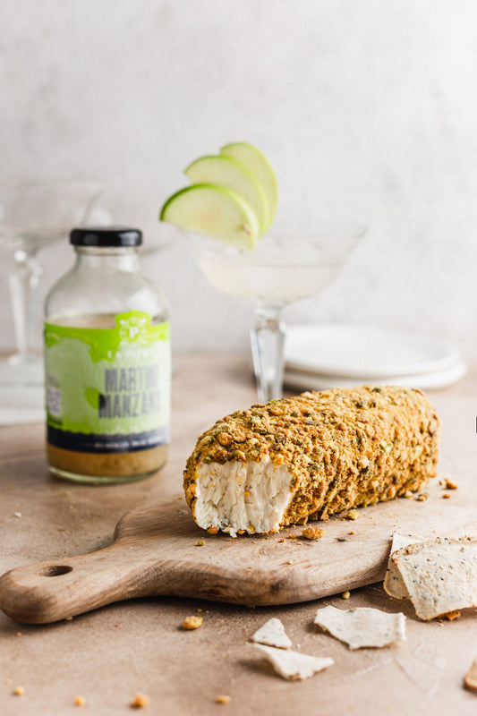 Rollito queso crema cebolla caramelizada pistacho