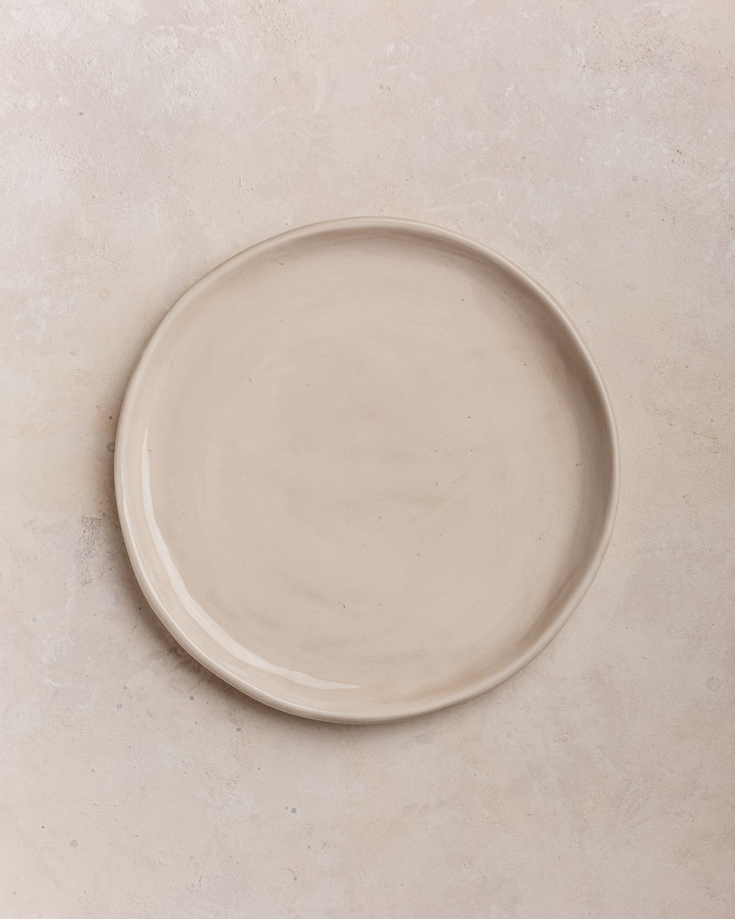 Plato Edge beige brillante L