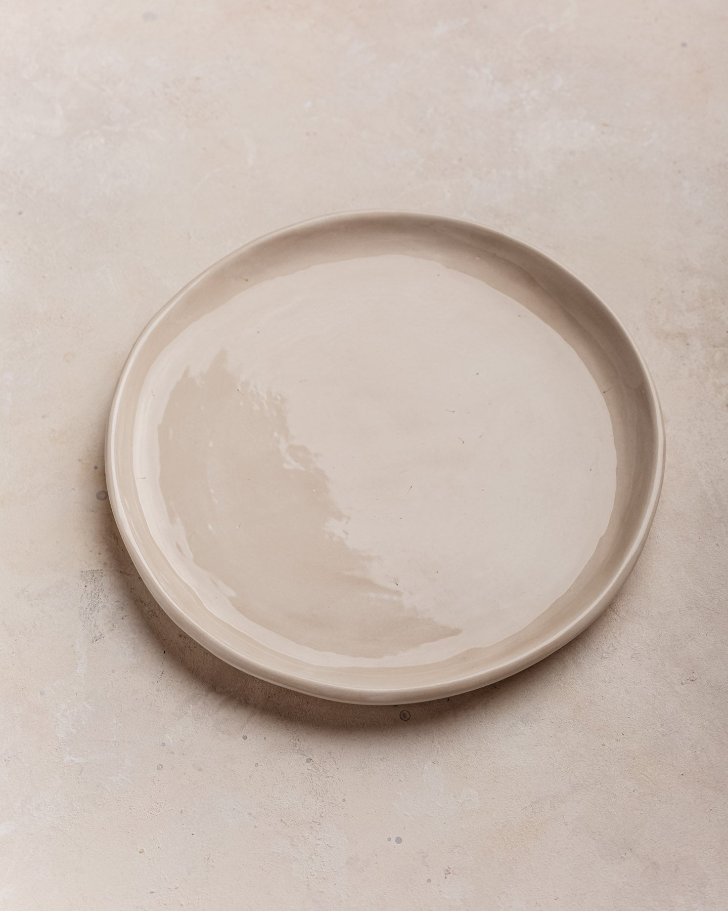 Plato Edge beige brillante L